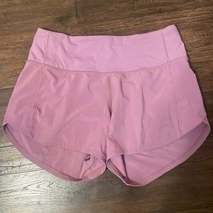 Rarely worn purple lululemon speed up low rise 4 inch shorts.